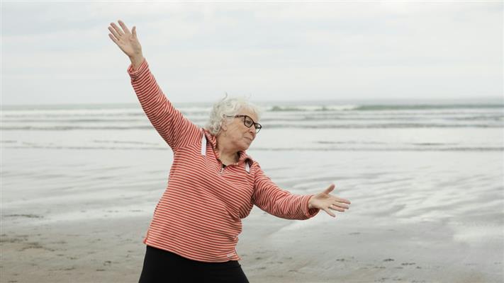 Gentle tai chi workouts for the elderly practice in a safe, uncluttered setting